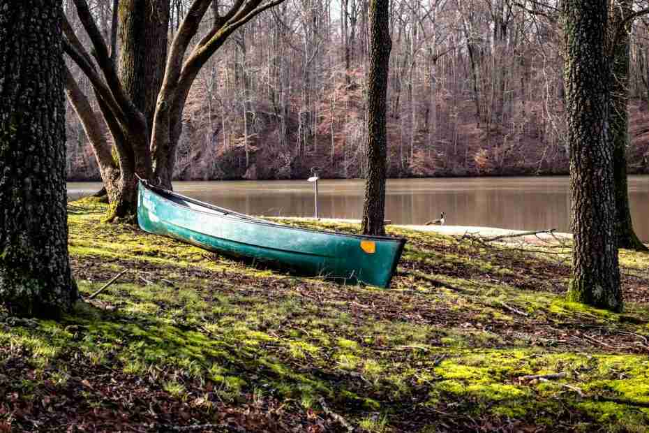 blue canoe boat beside body of water, indiana, outdoor