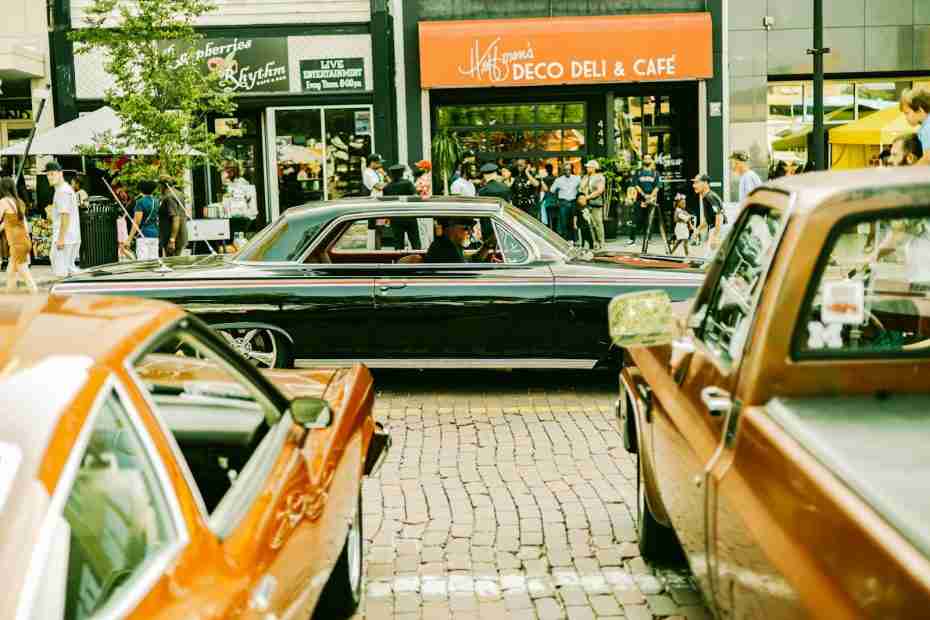 a group of cars that are sitting in the street, grand rapids