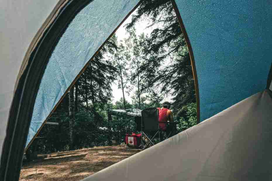 red car in a blue tent, state park, camping