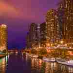 city skyline during night time, chicago tour, river